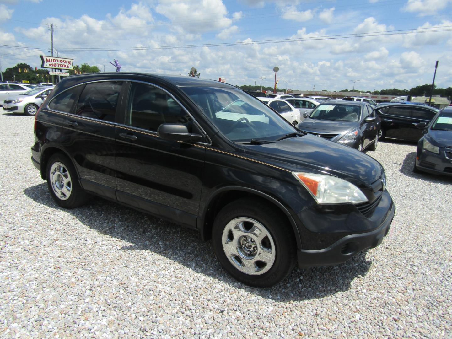 2009 Black /Gray Honda CR-V LX 2WD 5-Speed AT (5J6RE38369L) with an 2.4L L4 DOHC 16V engine, Automatic transmission, located at 15016 S Hwy 231, Midland City, AL, 36350, (334) 983-3001, 31.306210, -85.495277 - Photo#0